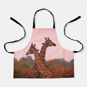 Giraffes with a pink sky apron