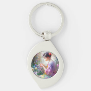 Girl admiring a flower in her hands  keychain