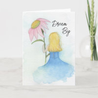 Girl holding a giant pink flower "Dream Big"