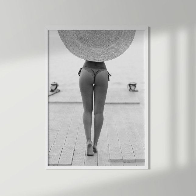 Girl in Hat on the Beach Black and White Print  (Girl in Hat on the Beach Black and White Print in a white frame on the wall.)
