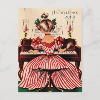 Girl is playing Christmas song on piano, vintage Postcard