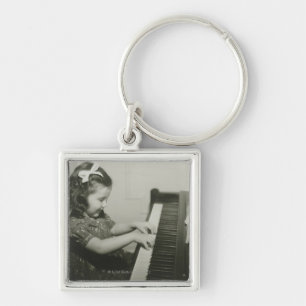 Girl Playing Piano Keychain