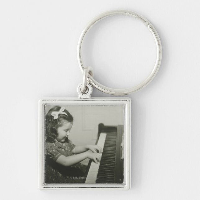 Girl Playing Piano Keychain (Front)