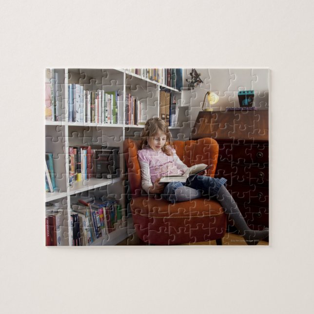Girl reading by the bookshelf jigsaw puzzle (Horizontal)