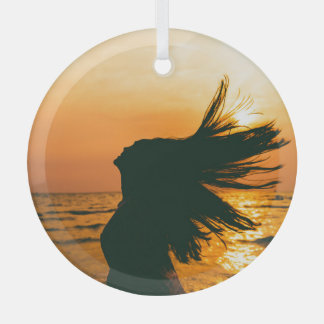 Girl silhouette, sea sunset, freedom. glass ornament