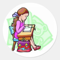 Girl Studies At Desk