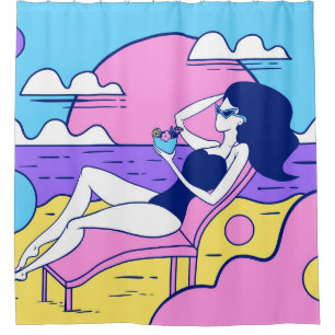 girl sunbathes on the beach with a cocktail in han