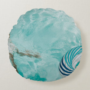 Girl wearing swimsuit and swims in swimming pool round pillow