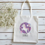 Girls Cute Purple Unicorn Rainbow & Name Kids Tote Bag<br><div class="desc">This cute and adorable unicorn themed kids tote bag features a unicorn cartoon,  planet,  stars,  a crown,  a rainbow and heart,  and can be personalized with your girls name. The perfect purple magical gift for your unicorn or princess loving child or toddler.</div>