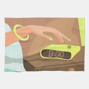 Girls hand pushing on alarm clock snooze button kitchen towel