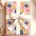 Girls Navy and Pink ABC Alphabet Pattern Wrapping Paper<br><div class="desc">This Girls Navy and Pink ABC Alphabet Pattern Wrapping Paper features fun, playful letters in bright colours like navy, pink, yellow, and teal. The polka-dotted letters against a soft pink background make it perfect for wrapping gifts for young children, especially for birthdays and baby showers. Its charming design adds a...</div>