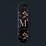 Girly Black Marble Rose Gold Foil Monogram Skateboard<br><div class="desc">Girly Black Marble Rose Gold Foil Monogram Skateboard with trendy coppery rose gold/pink on black marble and your custom monogram. Perfect for your girly,  luxury esthetic.</div>