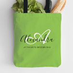 Girly Bright Green Trendy Elegant Script Monogram Tote Bag<br><div class="desc">Personalize your beautiful monogrammed, trendy bright green Grocery Tote Bag! The text below may be personalized to your preferred sentence or even your full name; you can also delete it if you prefer. If you need help, please let us know at belytaliarecipes@gmail.com, and we will gladly assist you. © Belytalia...</div>