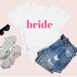 Girly Pink Retro Modern Bride Bachelorette T-Shirt<br><div class="desc">Fun,  flirty pink with simple vertical block lettering to give to each guest at the bachelorette party. Pretty keepsake favour for your favourite bride squad! Message me if you want something different than what you see here-happy to create something custom for you.</div>