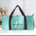Glam Aqua Brushed Metal Black White Monogram  Duffle Bag<br><div class="desc">This personalized duffel bag features a monogram and first name in modern black and white script on a glam aqua faux brushed metal background.</div>