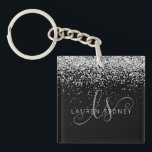 Glam Black Silver Glitter Monogram Name Keychain<br><div class="desc">Glam Black Silver Glitter Elegant Monogram Keychain Easily personalize this trendy chic keychain design featuring elegant silver sparkling glitter on a black background. The design features your handwritten script monogram with pretty swirls and name.</div>