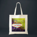 Glam Las Vegas Wedding Maid of Honour Gift Tote Bag<br><div class="desc">Big and glamourous Las Vegas strip sign tall palm trees and colourful stars yellow & purple shades background illustrated on custom Maid of Honour Gift Bags. Personalize the artsy and unique tote bags for your maid of honour and/or bridesmaids to thank them! ((You can find the matching wedding essentials &...</div>