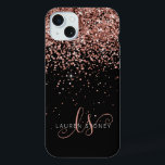 Glam Rose Gold Glitter Elegant Monogram iPhone 15 Plus Case<br><div class="desc">Glam Rose Gold Glitter Elegant Monogram iPhone Case. Easily personalize this trendy chic phone case design featuring elegant rose gold sparkling glitter on a black background. The design features your handwritten script monogram with pretty swirls and name.</div>