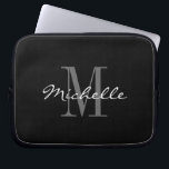 Glamourous black and white monogram laptop sleeves<br><div class="desc">Glamourous black and white monogram laptop sleeves. Elegant script typography design with monogrammed initial letter. Classy template for men women and kids. Custom computer accessories with luxurious logo. Cute Birthday gift idea for mom, dad, son, daughter, co worker, employee, boss etc. Pretty covers available in different sizes; 10 13 and...</div>