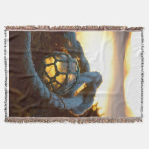 Glass float glows at sunset, Alaska Throw Blanket