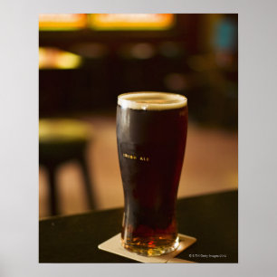 Glass of Irish ale in pub Poster
