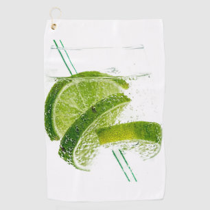 Glass of water with lime slices and straws Best Golf Towel