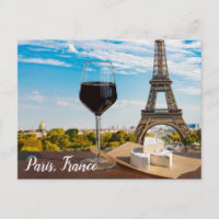 Glass of wine with brie cheese on Eiffel tower Pos