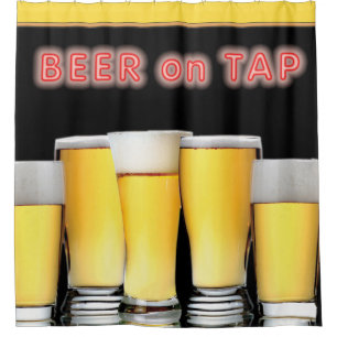 Glasses of Beer with Neon Sign BEER ON TAP