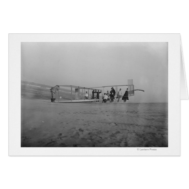 Glider being prepared for flight by (Front Horizontal)