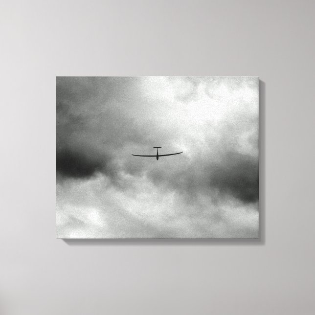 Glider flying in gray sky canvas print (Front)