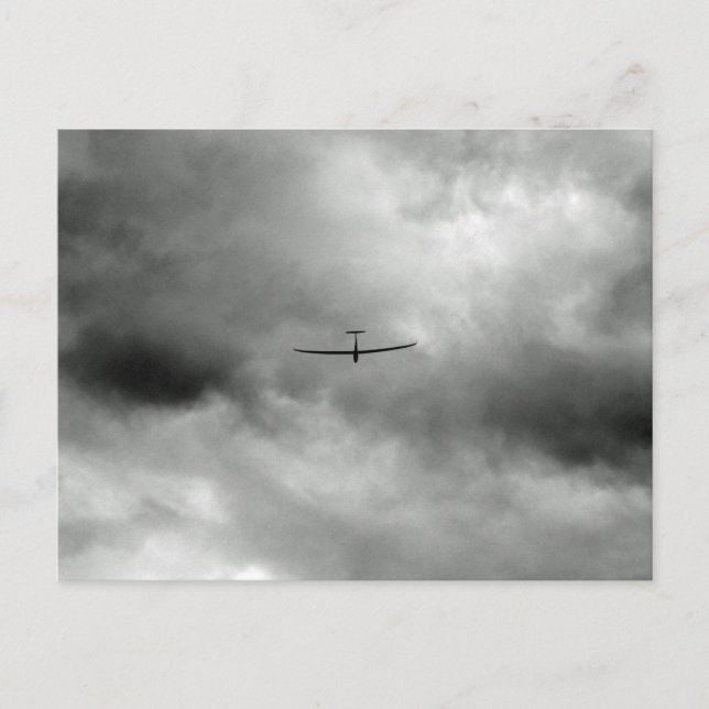 Glider flying in grey sky postcard (Front)