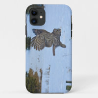 Gliding Great Grey Owl and Snow Wildlife Raptor