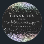 Glitter Future Mrs Bridal Shower Thank You Black Classic Round Sticker<br><div class="desc">Future Mrs Rainbow Glitter Bridal Shower Thank You Black The Future Mrs is in an artsy set script with ring and heart motifs and the rest of the text you can easily personalise. Multicolor faux Glitter decorates the top and bottom edges. With white text on a black background.</div>