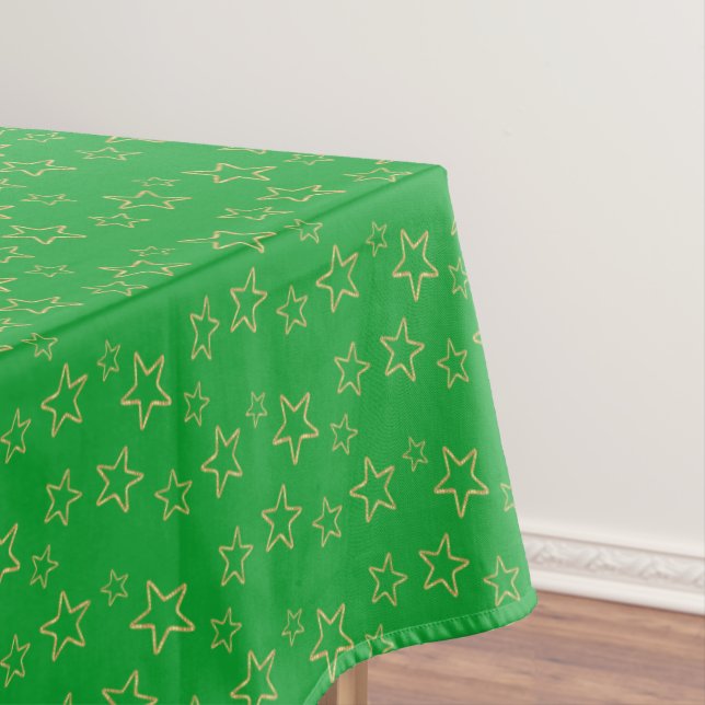 Glittering Golden Star Silhouettes on Green Tablecloth (In Situ)