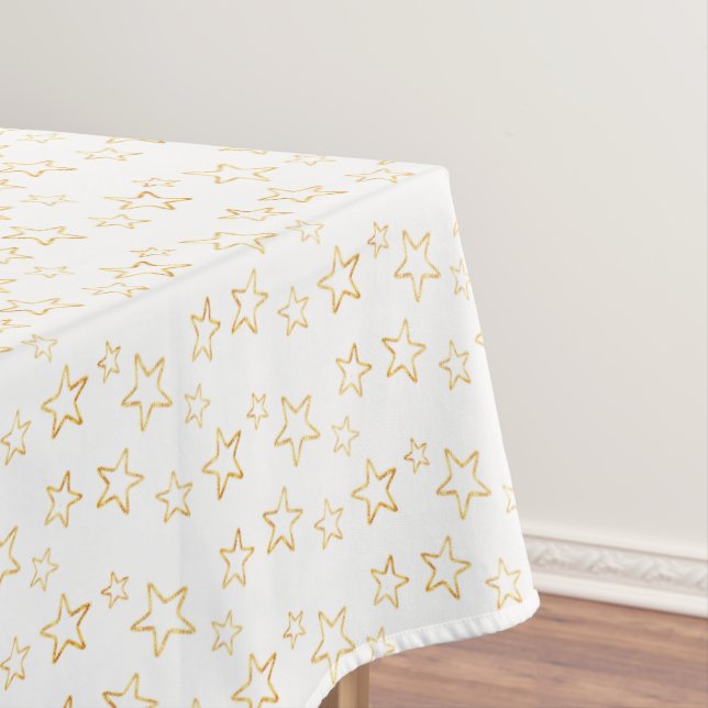 Glittering Golden Star Silhouettes on White Tablecloth (In Situ)