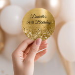 Glittery Gold Foil 50th Birthday Classic Round Sticker<br><div class="desc">Create your own fancy monogram stylish milestone birthday celebration envelope seals for her. The background features a golden yellow ombre brushed metal style foil digital art graphic. Along the bottom is a band of gold faux glitter girly glam. Customize the font colour, size or style. The luxury sparkles, glitter and...</div>