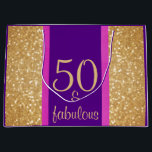 Glittery Purple & Pink 50 & Fabulous 50th Birthday Large Gift Bag<br><div class="desc">Elegant "50 & fabulous" birthday gift bag is designed with glittery gold looking borders. The centre background is purple and bordered on both sides with a line of hot pink to compliment the design. The gold toned text is set with elegant font. The background of the gift bag is a...</div>