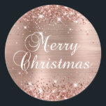 Glittery Rose Gold Foil Merry Christmas Classic Round Sticker<br><div class="desc">Fancy calligraphy Merry Christmas envelope seal stickers for your special holiday greetings or invite. Girly faux sparkly rose gold glitter on the top and bottom edge over a faux blush pink and rose gold brushed metal style ombre foil. The colour of the old-fashioned text graphic can be changed. The main...</div>