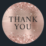 Glittery Rose Gold Foil Thank You Classic Round Sticker<br><div class="desc">Create your own all caps thank you party favour stickers. Girly faux sparkly rose gold glitter on the top and bottom edge, over a faux pink blush rose gold brushed metal style ombre foil. Customize the font style to create your own favour sticker design for her special wedding celebration. A...</div>