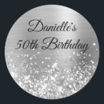 Glittery Silver Foil 50th Birthday Classic Round Sticker<br><div class="desc">Create your own fancy monogram stylish milestone birthday celebration envelope seals for her. The background features a silver ombre brushed metal style foil digital art graphic. Along the bottom is a band of silvery grey faux glitter girly glam. Customize the font colour, size or style. The luxury sparkles, glitter and...</div>