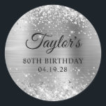 Glittery Silver Foil 80th Birthday Classic Round Sticker<br><div class="desc">Create your own 80th birthday party favour stickers. Girly faux sparkly silver glitter on the top and bottom edge, over a faux stainless steel metallic style ombre foil. Customize the font styles to create your own favour sticker design for her special celebration. A classic elegant calligraphy paired with an all...</div>
