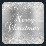 Glittery Silver Foil Merry Christmas Square Sticker<br><div class="desc">Fancy calligraphy Merry Christmas party favour stickers for their special celebration. Girly faux sparkly silver glitter on the top and bottom edge over a faux silvery grey brushed metal style ombre foil. The colour of the holiday text graphic can be changed. The main colours in this girly design are silver,...</div>