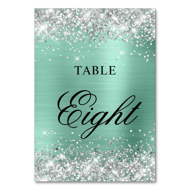 Glittery Silver Light Teal Foil Fancy Calligraphy Table Number (Front)