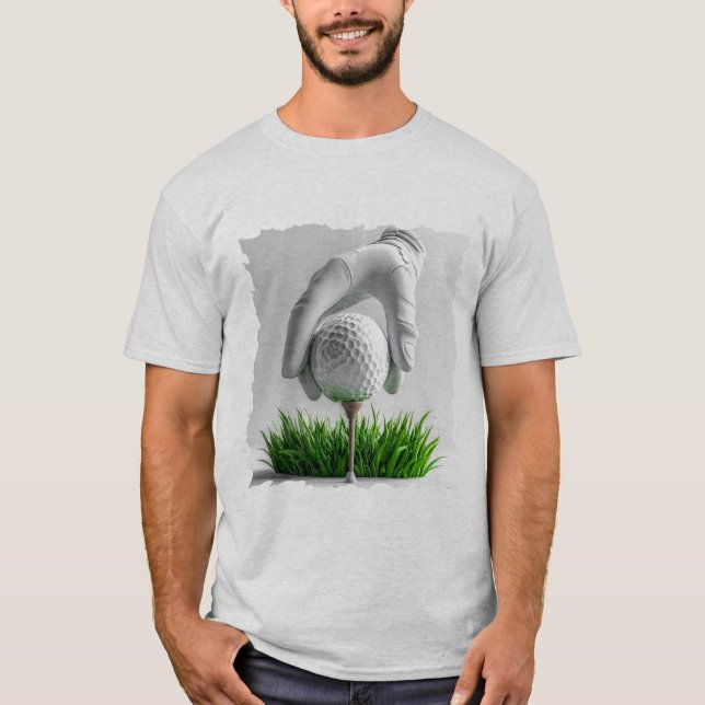 Gloved Hand Placing Golf Ball on Tee with Grass (Front)