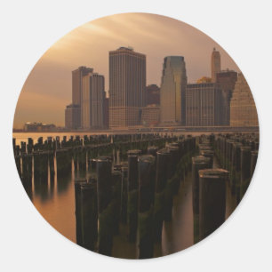 Glow of sunset during stormy skies over East Classic Round Sticker