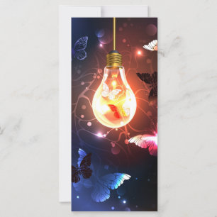 Glowing Light Bulb with Night Butterflies