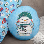 Glowing Lights Winter Wonders Snowman Christmas Round Pillow<br><div class="desc">Elevate your holiday decor with our enchanting "Glowing Winter Wonders" Round Throw Pillow. This delightful pillow is a captivating addition to your festive ambiance, boasting a playful design that encapsulates the enchanting spirit of the Christmas season. The front of the pillow features an endearing snowman tangled in glowing lights, radiating...</div>