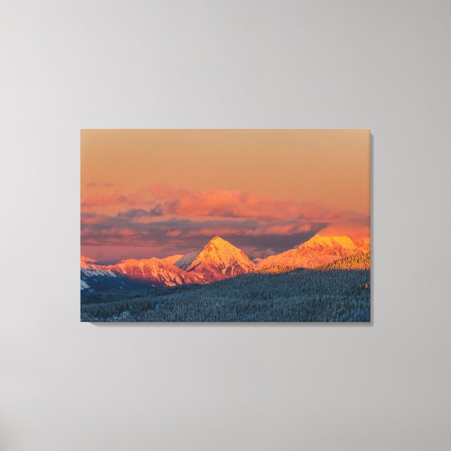 Glowing orange winter mountain range canvas print (Front)