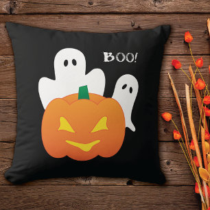 Glowing Pumpkin and Ghosts Throw Pillow
