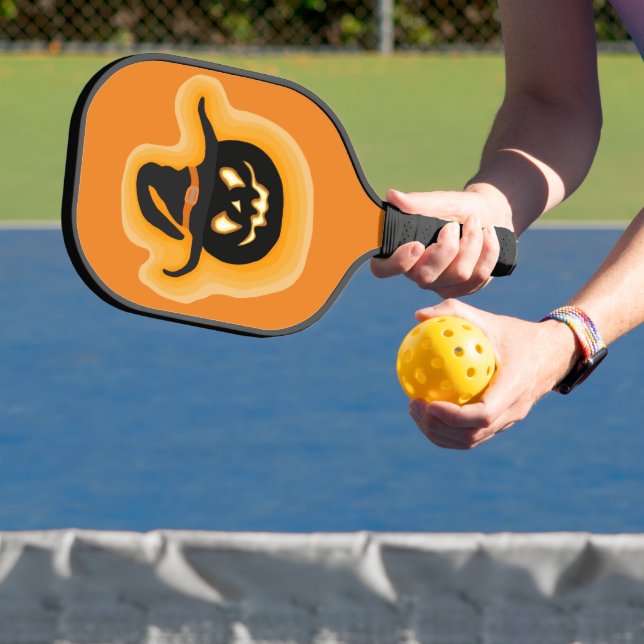 Glowing Pumpkin Witch On Orange Pickleball Paddle (Insitu)